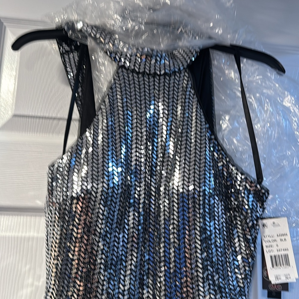 Silver Sequin Gown never worn size 0 purchased at Bloomingdale’s. - Picture 4 of 11